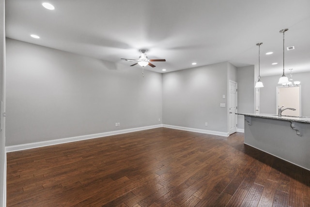 369 Carriage House Ln Unit L509, Hendersonville, TN 37075 - unfurnished living room featuring a ceiling fan, recessed lighting, dark wood-style flooring, baseboards, and a sink