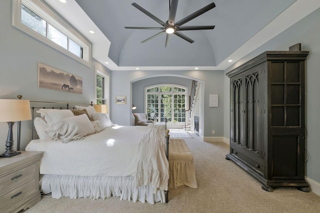 1120 Natchez Valley Ln, Franklin, TN 37064 - bedroom with vaulted ceiling, recessed lighting, light colored carpet, arched walkways, and baseboards