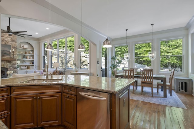 1120 Natchez Valley Ln, Franklin, TN 37064 - kitchen featuring a ceiling fan, a sink, light wood-style flooring, dishwasher, and light stone countertops