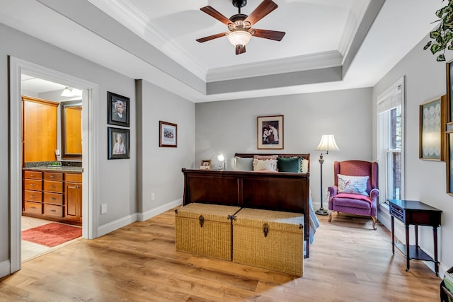 1120 Natchez Valley Ln, Franklin, TN 37064 - bedroom with a tray ceiling, crown molding, light wood finished floors, baseboards, and ensuite bathroom