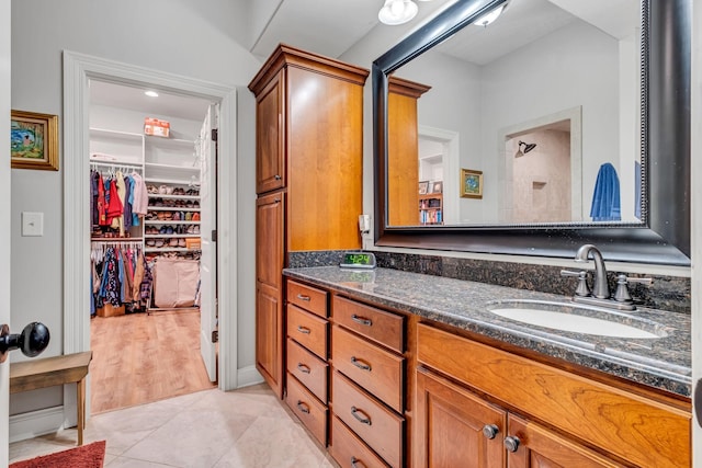 1120 Natchez Valley Ln, Franklin, TN 37064 - full bath with vanity, a spacious closet, tiled shower, and tile patterned floors