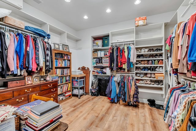 1120 Natchez Valley Ln, Franklin, TN 37064 - walk in closet with wood finished floors and a wall mounted AC