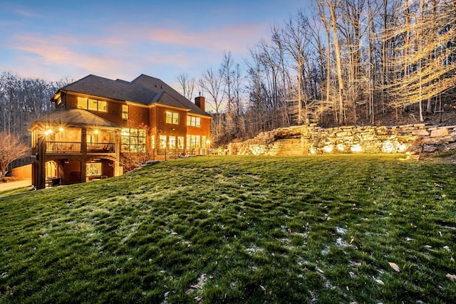 1120 Natchez Valley Ln, Franklin, TN 37064 - rear view of property featuring a yard, a chimney, and a deck