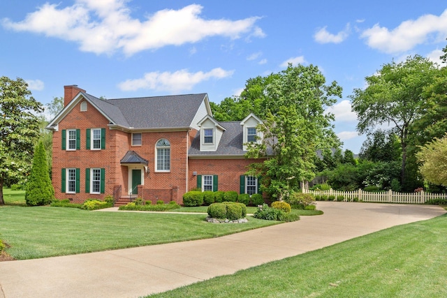 906 Knight Cir, Murfreesboro, TN 37129 - view of front of home featuring brick siding and a chimney