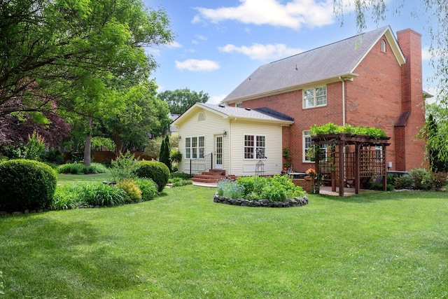 906 Knight Cir, Murfreesboro, TN 37129 - rear view of house with a pergola, a yard, a chimney, and brick siding