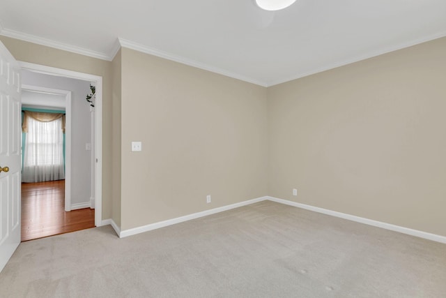 906 Knight Cir, Murfreesboro, TN 37129 - empty room featuring crown molding, light colored carpet, and baseboards