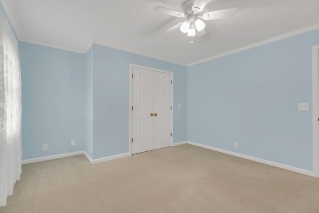 906 Knight Cir, Murfreesboro, TN 37129 - empty room with crown molding, light carpet, a ceiling fan, and baseboards