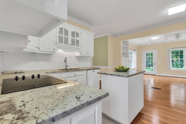 906 Knight Cir, Murfreesboro, TN 37129 - kitchen with a sink, black electric stovetop, a center island, white dishwasher, and crown molding