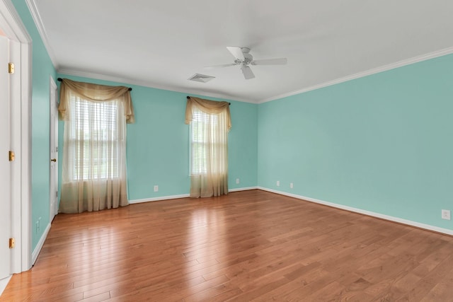 906 Knight Cir, Murfreesboro, TN 37129 - spare room featuring ornamental molding, a ceiling fan, wood finished floors, and baseboards