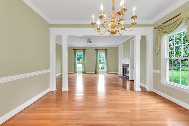 906 Knight Cir, Murfreesboro, TN 37129 - unfurnished living room with healthy amount of natural light, a premium fireplace, light wood-style floors, and crown molding