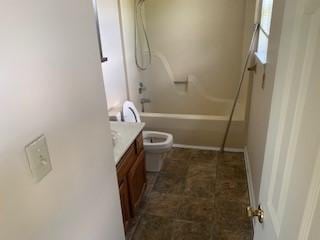 924 Linda Dr, Oak Grove, KY 42262 - bathroom featuring vanity, toilet, and shower / bathtub combination