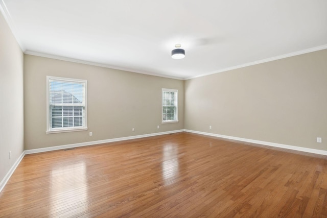 1120 Banbury Ln, Brentwood, TN 37027 - empty room featuring ornamental molding, light wood-style floors, and baseboards