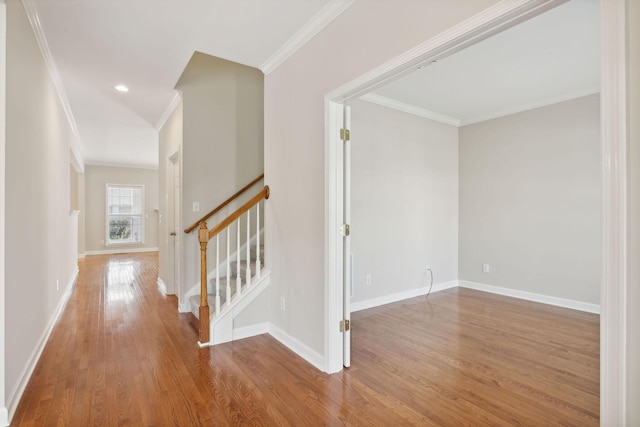 1120 Banbury Ln, Brentwood, TN 37027 - hall featuring ornamental molding, wood finished floors, stairway, baseboards, and recessed lighting