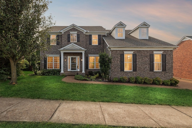 1120 Banbury Ln, Brentwood, TN 37027 - colonial home featuring a front lawn and brick siding