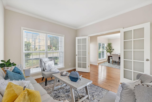1120 Banbury Ln, Brentwood, TN 37027 - living area featuring ornamental molding, wood finished floors, french doors, and baseboards