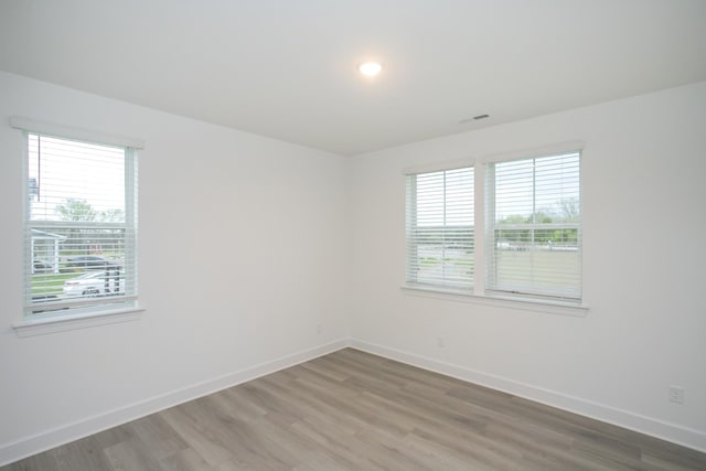 118 W Cassa Way, Mount Juliet, TN 37122 - empty room with baseboards and light wood-style flooring