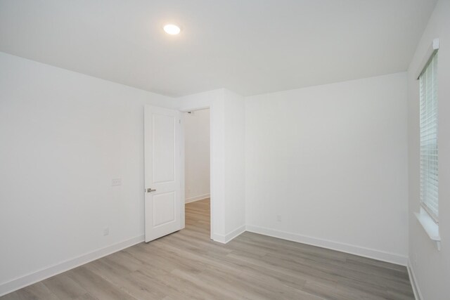 118 W Cassa Way, Mount Juliet, TN 37122 - empty room featuring light wood-style floors, baseboards, and recessed lighting