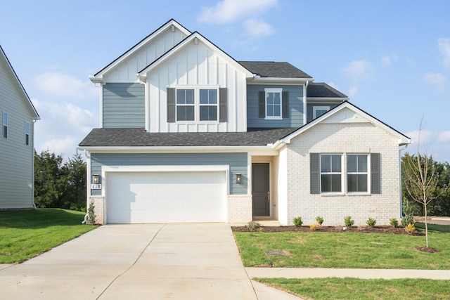 118 W Cassa Way, Mount Juliet, TN 37122 - view of front of property featuring board and batten siding, an attached garage, driveway, a front lawn, and brick siding