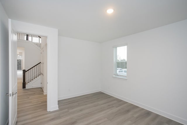 118 W Cassa Way, Mount Juliet, TN 37122 - spare room with light wood finished floors, plenty of natural light, stairs, and baseboards