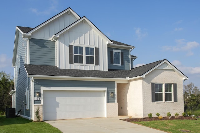 118 W Cassa Way, Mount Juliet, TN 37122 - view of front of house featuring an attached garage, board and batten siding, concrete driveway, and brick siding