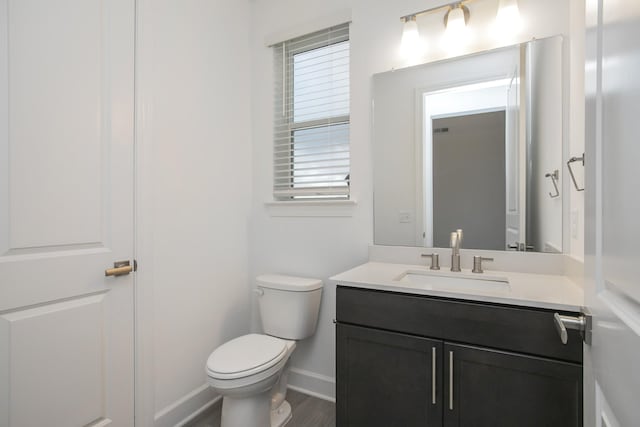 118 W Cassa Way, Mount Juliet, TN 37122 - half bathroom with toilet, vanity, baseboards, wood finished floors, and plenty of natural light