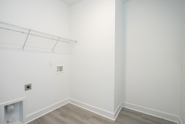 118 W Cassa Way, Mount Juliet, TN 37122 - laundry area featuring hookup for an electric dryer, wood finished floors, hookup for a washing machine, and baseboards