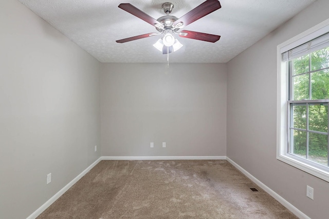 104 Evanmeade Dr, Smyrna, TN 37167 - empty room with carpet, baseboards, a ceiling fan, and a textured ceiling