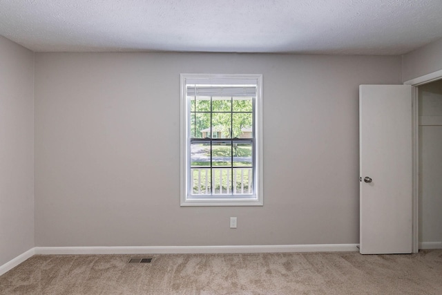 104 Evanmeade Dr, Smyrna, TN 37167 - carpeted spare room with baseboards and a textured ceiling