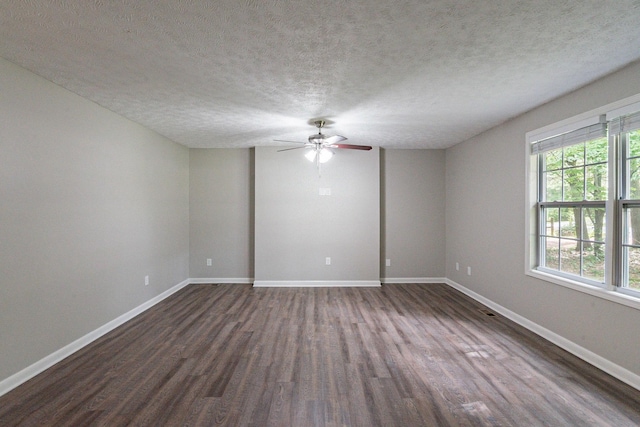 104 Evanmeade Dr, Smyrna, TN 37167 - empty room featuring dark wood-type flooring, a ceiling fan, baseboards, and a textured ceiling
