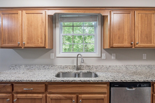 104 Evanmeade Dr, Smyrna, TN 37167 - kitchen with dishwasher, a sink, light stone countertops, and brown cabinetry