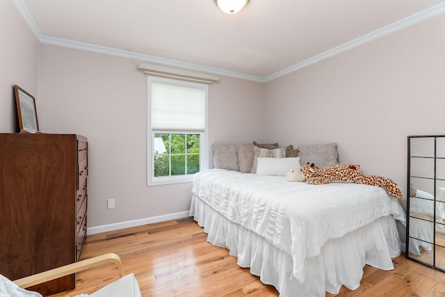 24 Hillcrest Dr, Sparta, TN 38583 - bedroom with crown molding, light wood-style floors, and baseboards