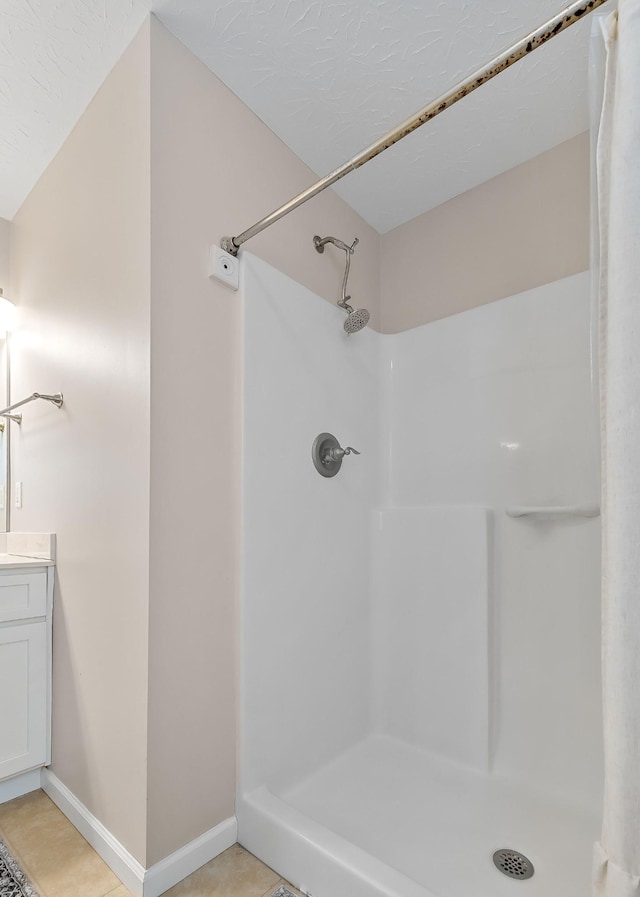 24 Hillcrest Dr, Sparta, TN 38583 - full bathroom with a shower with curtain, baseboards, vanity, and tile patterned floors