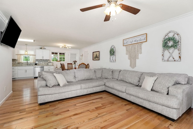 24 Hillcrest Dr, Sparta, TN 38583 - living area with ornamental molding, ceiling fan, and light wood-type flooring
