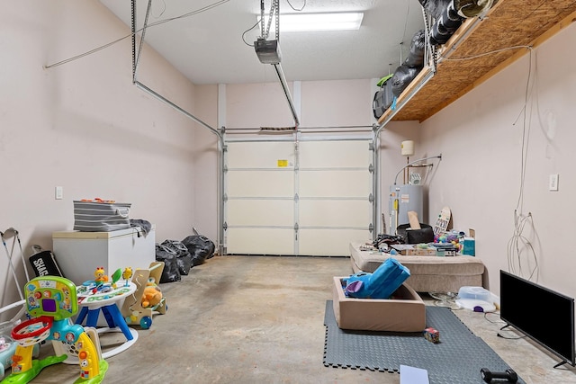 24 Hillcrest Dr, Sparta, TN 38583 - garage featuring electric water heater and a garage door opener