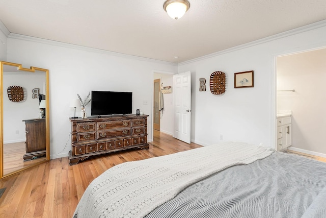24 Hillcrest Dr, Sparta, TN 38583 - bedroom featuring crown molding, light wood-style floors, baseboards, and ensuite bath