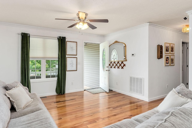 24 Hillcrest Dr, Sparta, TN 38583 - living room with crown molding, ceiling fan, light wood-type flooring, and baseboards
