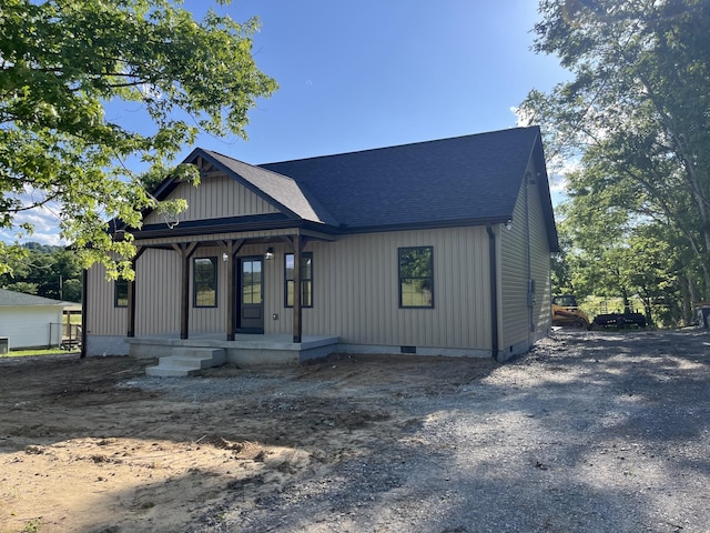 52 Hickman Hwy, Gordonsville, TN 38563 - modern farmhouse style home featuring covered porch, crawl space, and roof with shingles