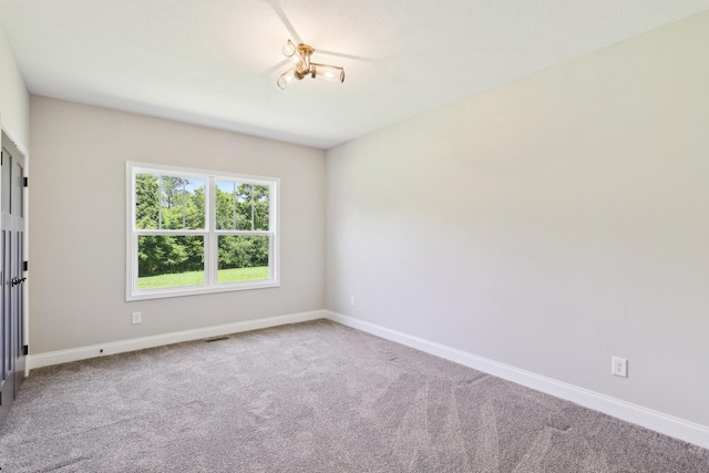 1373 Southside Rd, Southside, TN 37171 - empty room featuring carpet floors and baseboards