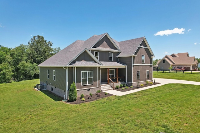 1373 Southside Rd, Southside, TN 37171 - craftsman-style house with a porch, roof with shingles, cooling unit, and board and batten siding