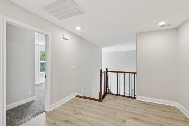 1373 Southside Rd, Southside, TN 37171 - spare room featuring light wood-type flooring, baseboards, and recessed lighting