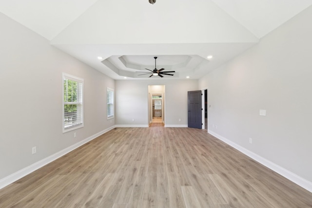1373 Southside Rd, Southside, TN 37171 - unfurnished room featuring ceiling fan, light wood-type flooring, baseboards, a raised ceiling, and recessed lighting