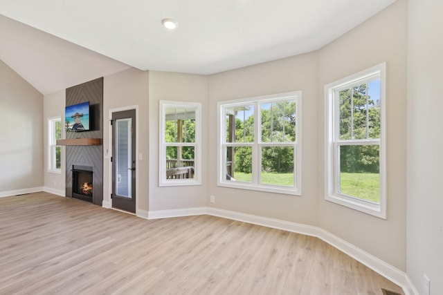 1373 Southside Rd, Southside, TN 37171 - unfurnished living room featuring light wood-type flooring, healthy amount of natural light, and baseboards
