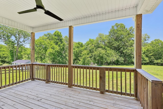 1373 Southside Rd, Southside, TN 37171 - wooden deck featuring a ceiling fan, a lawn, and view of wooded area