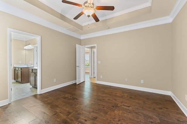 3216 Saltville Aly, Nolensville, TN 37135 - unfurnished bedroom with a raised ceiling, dark wood-type flooring, crown molding, baseboards, and ensuite bathroom