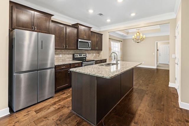3216 Saltville Aly, Nolensville, TN 37135 - kitchen with stainless steel appliances, crown molding, a chandelier, dark brown cabinets, and a sink