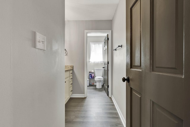 1430 Blythe Ferry Rd NE, Cleveland, TN 37312 - corridor featuring dark wood-style floors and baseboards