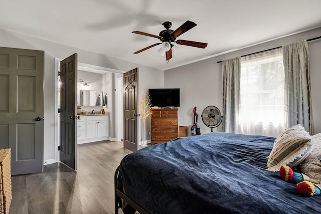 1430 Blythe Ferry Rd NE, Cleveland, TN 37312 - bedroom with wood finished floors, connected bathroom, a ceiling fan, and baseboards