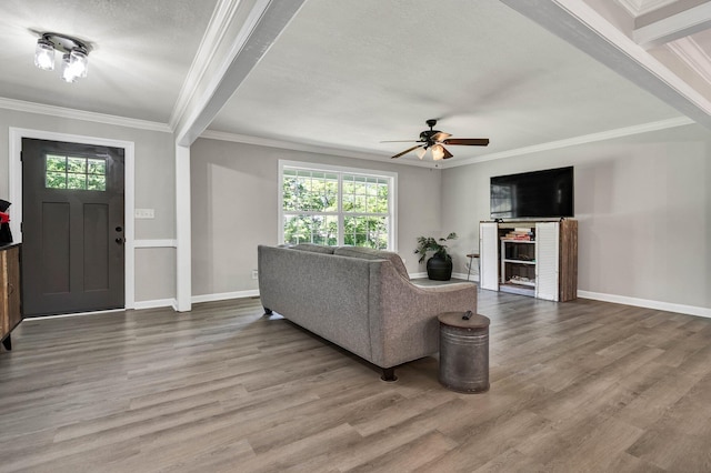 1430 Blythe Ferry Rd NE, Cleveland, TN 37312 - living area featuring ornamental molding, wood finished floors, a ceiling fan, baseboards, and a textured ceiling