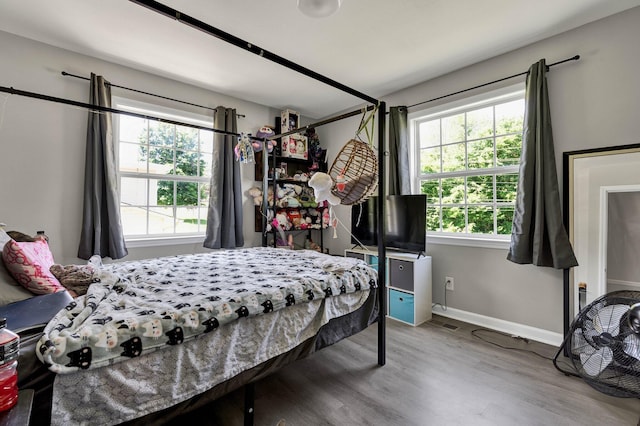 1430 Blythe Ferry Rd NE, Cleveland, TN 37312 - bedroom with wood finished floors and baseboards