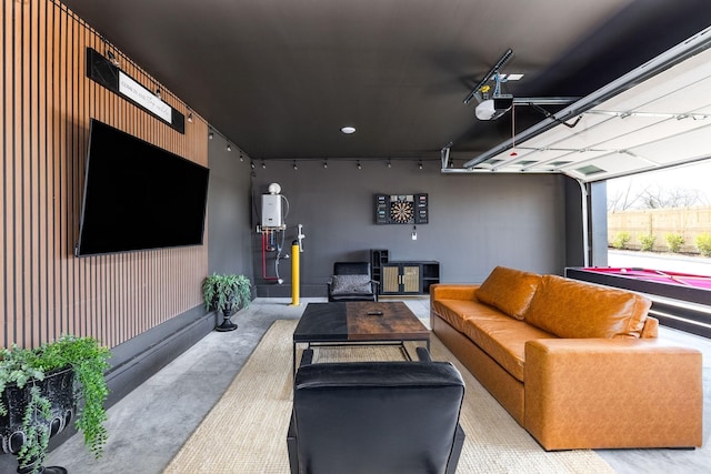 326A E Trinity Ln, Nashville, TN 37207 - living area with track lighting, water heater, and concrete flooring